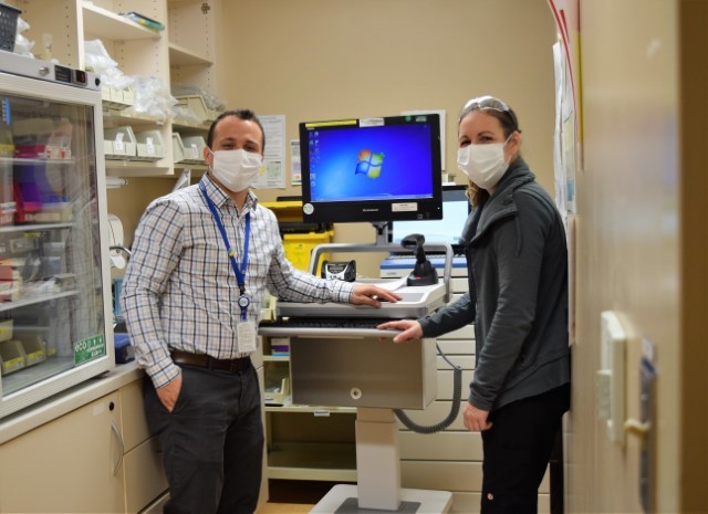 Clinical Manager Michael Paglia and Jennifer Sanger, RAI Coordinator at Winchester District Memorial Hospital check out the new portable Workstations on Wheels. 